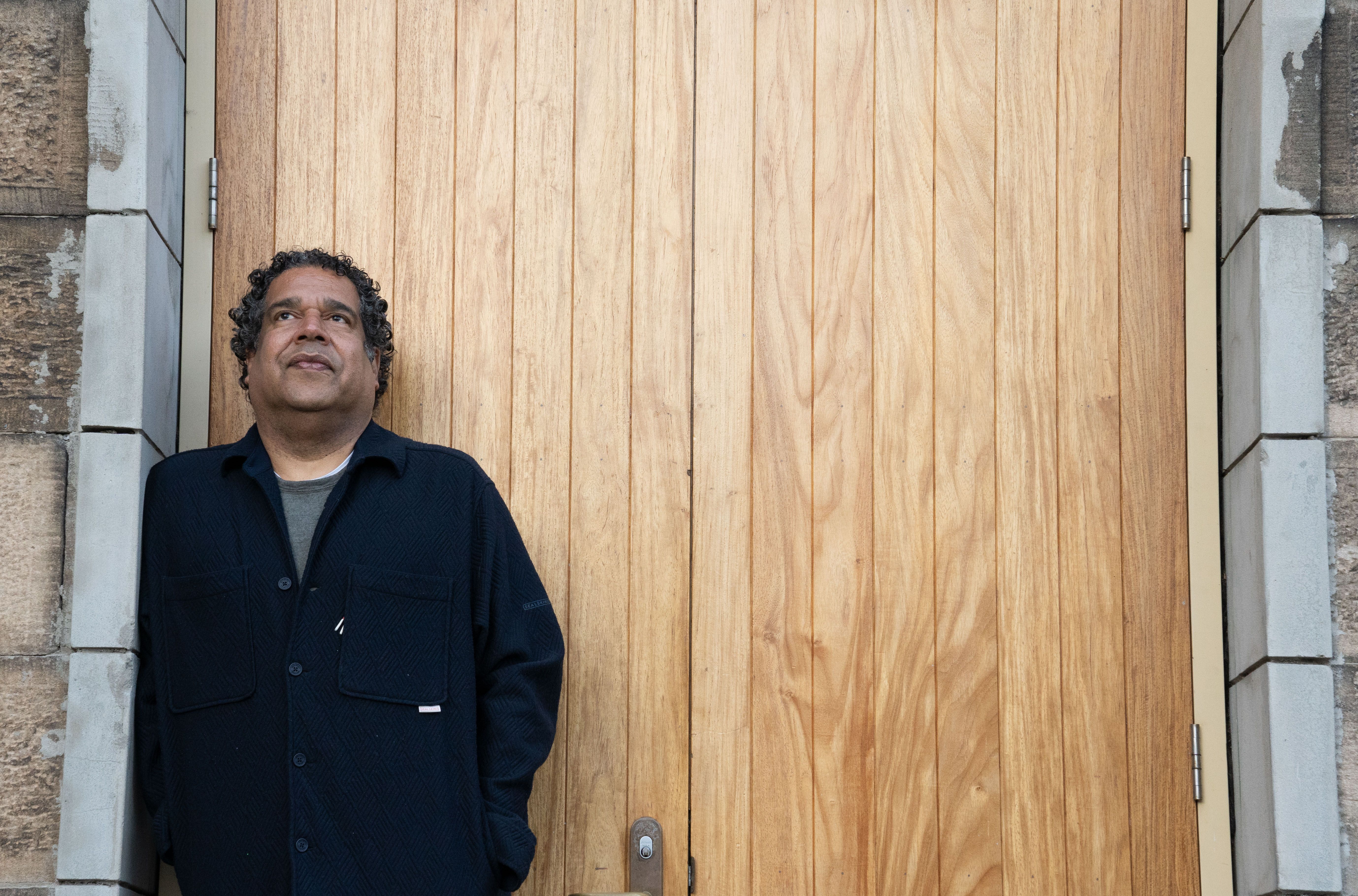 John Waight stands in a doorway at National Art School, Sydney